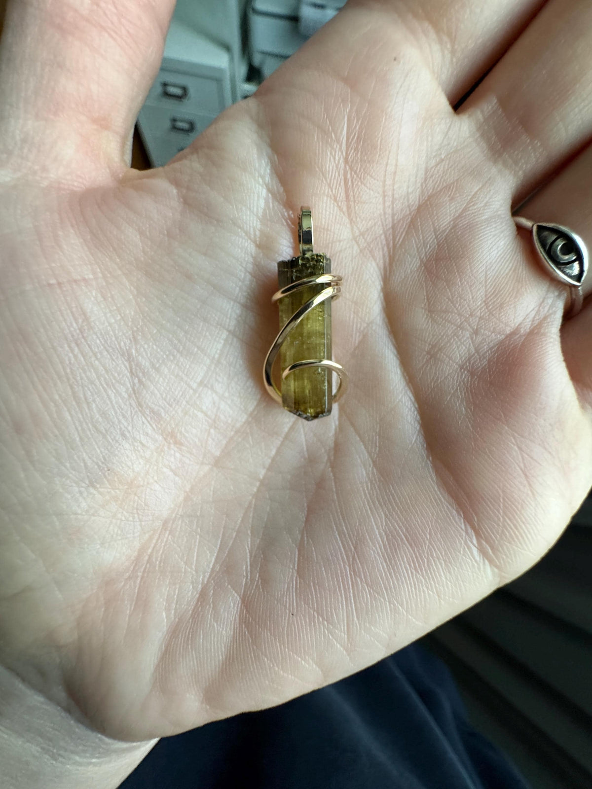 Yellow tourmaline crystal in 14k gold pendant