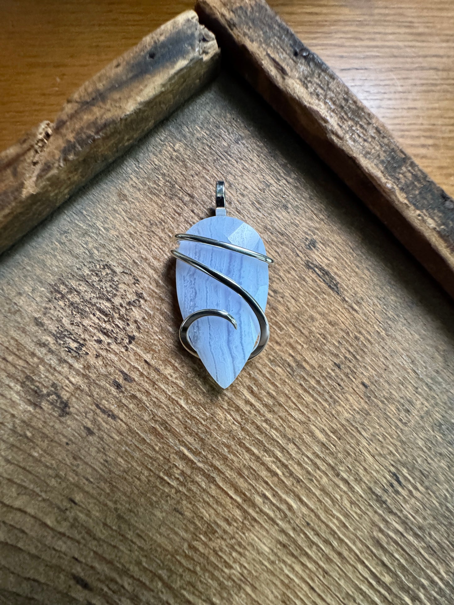 Faceted blue lace agate in sterling silver pendant
