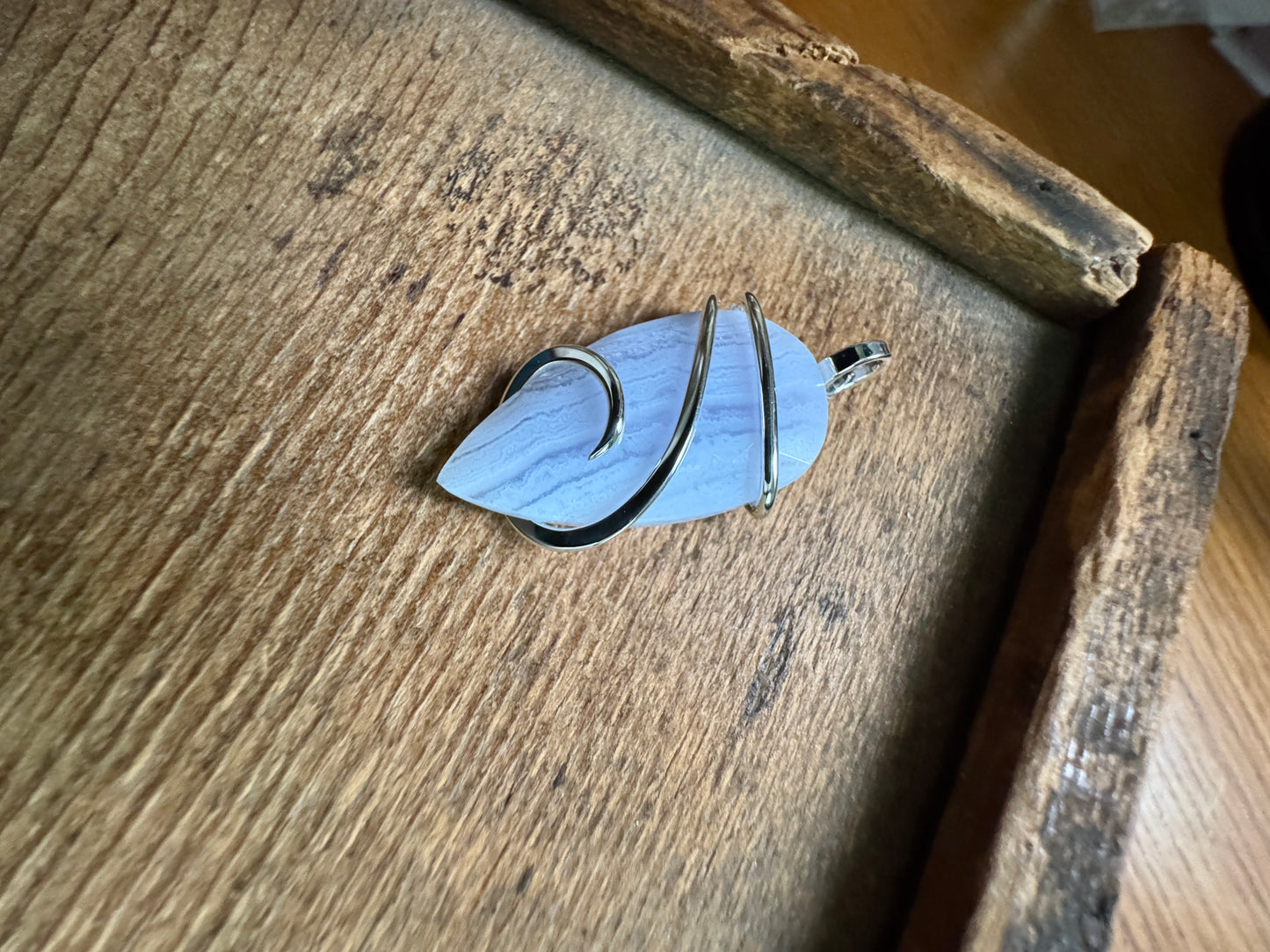 Faceted blue lace agate in sterling silver pendant