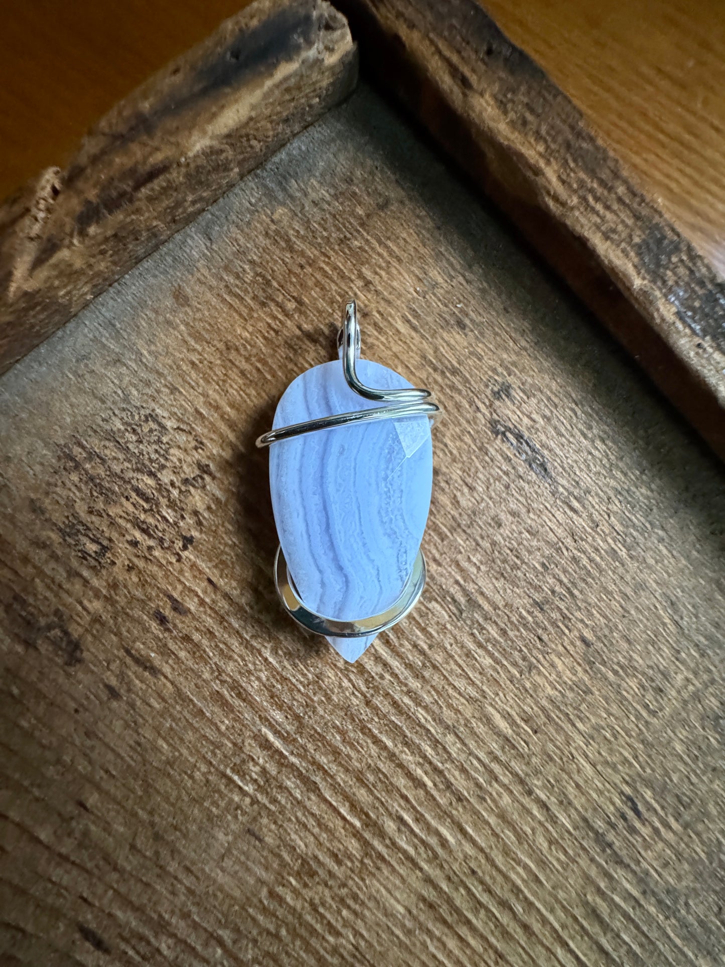 Faceted blue lace agate in sterling silver pendant