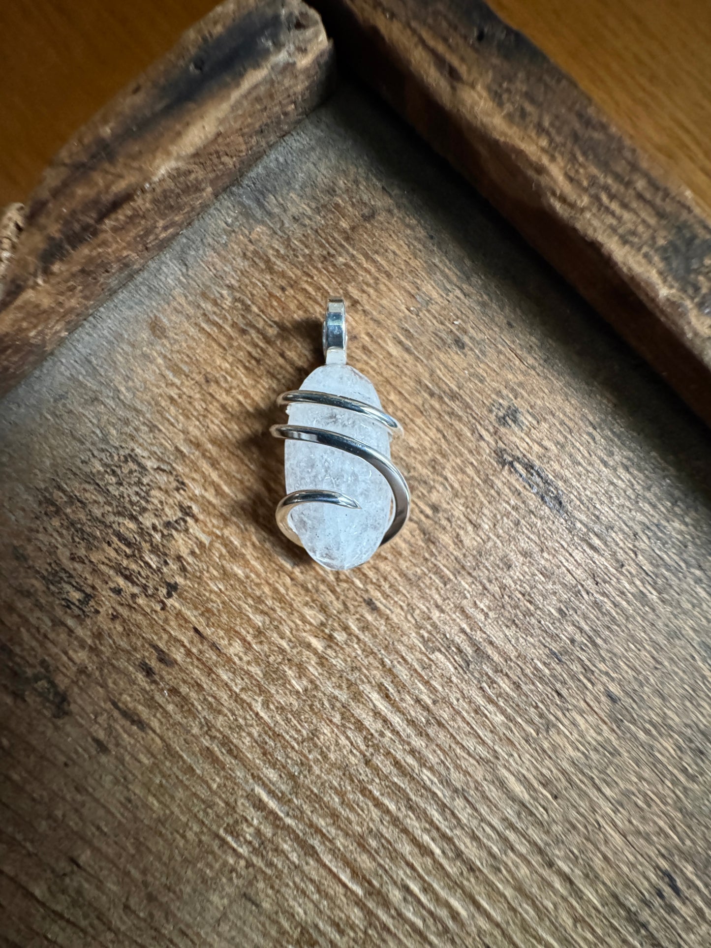 Faceted danburite in sterling silver pendant