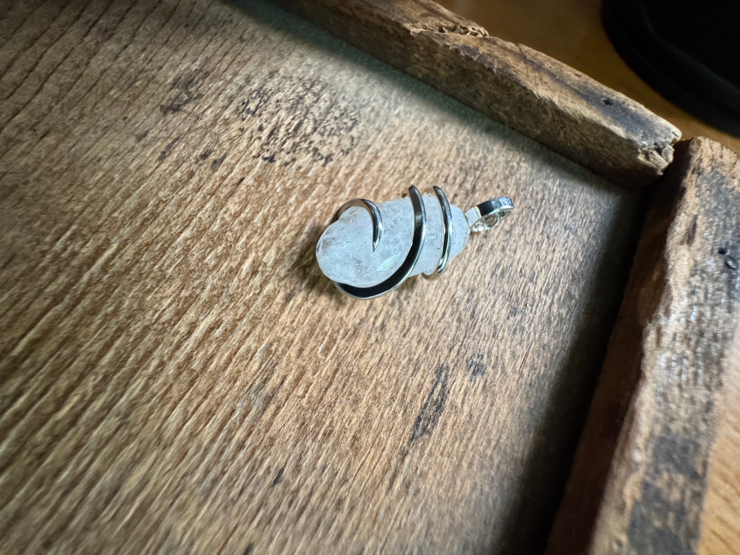Faceted danburite in sterling silver pendant