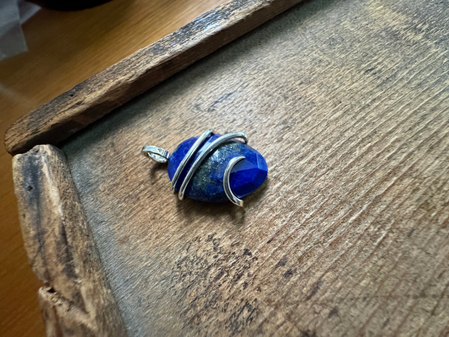 Faceted lapis in sterling silver pendant