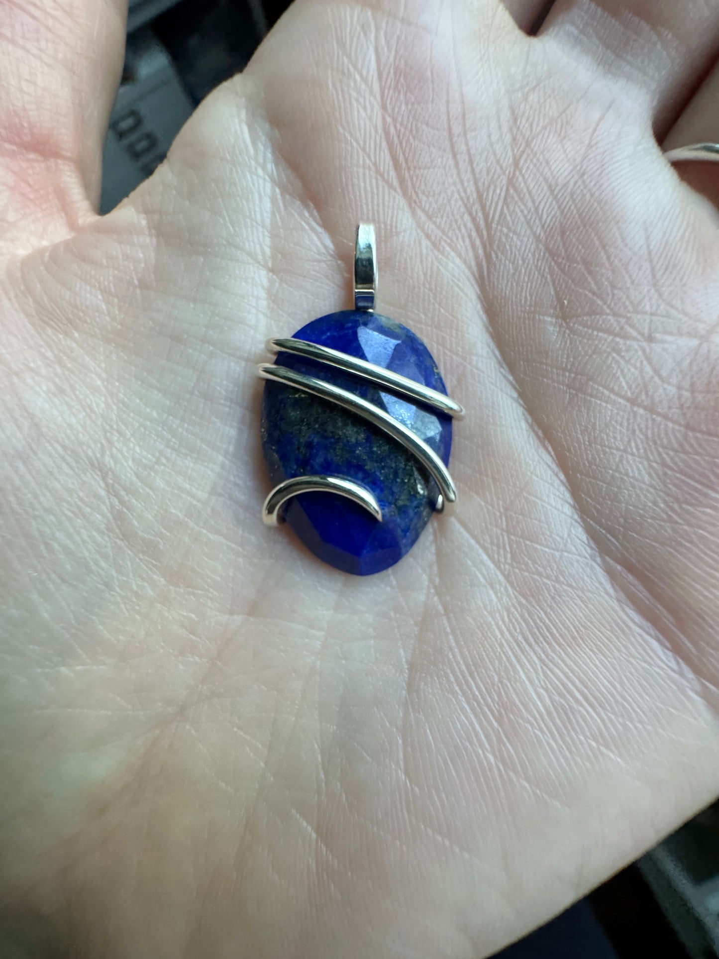 Faceted lapis in sterling silver pendant