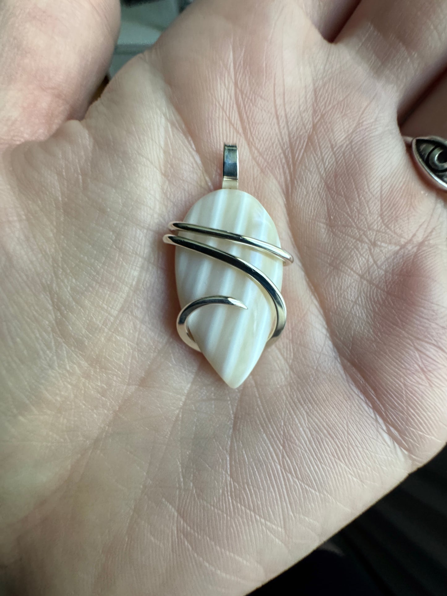 Shell in forged sterling silver pendant
