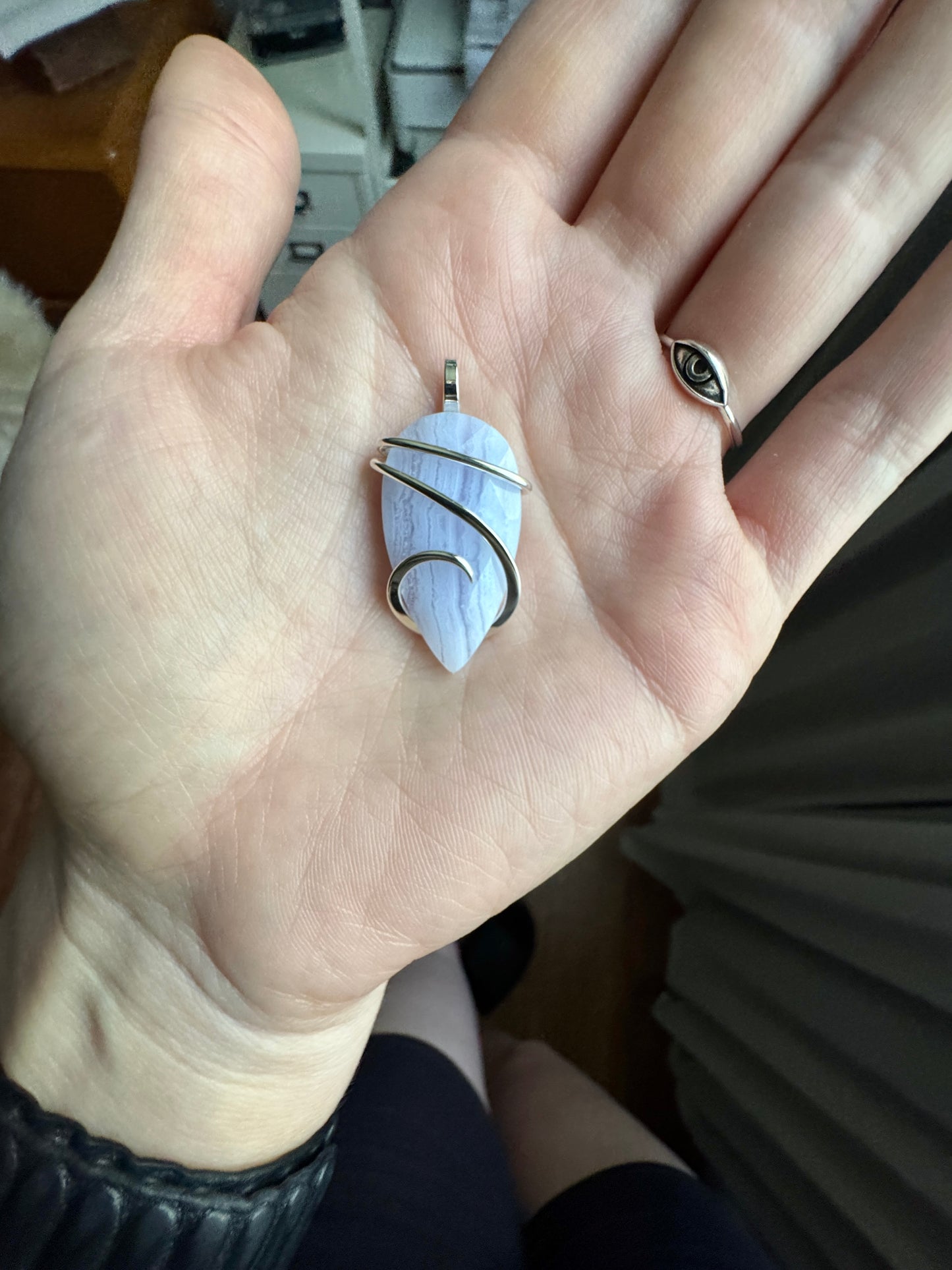 Faceted blue lace agate in sterling silver pendant