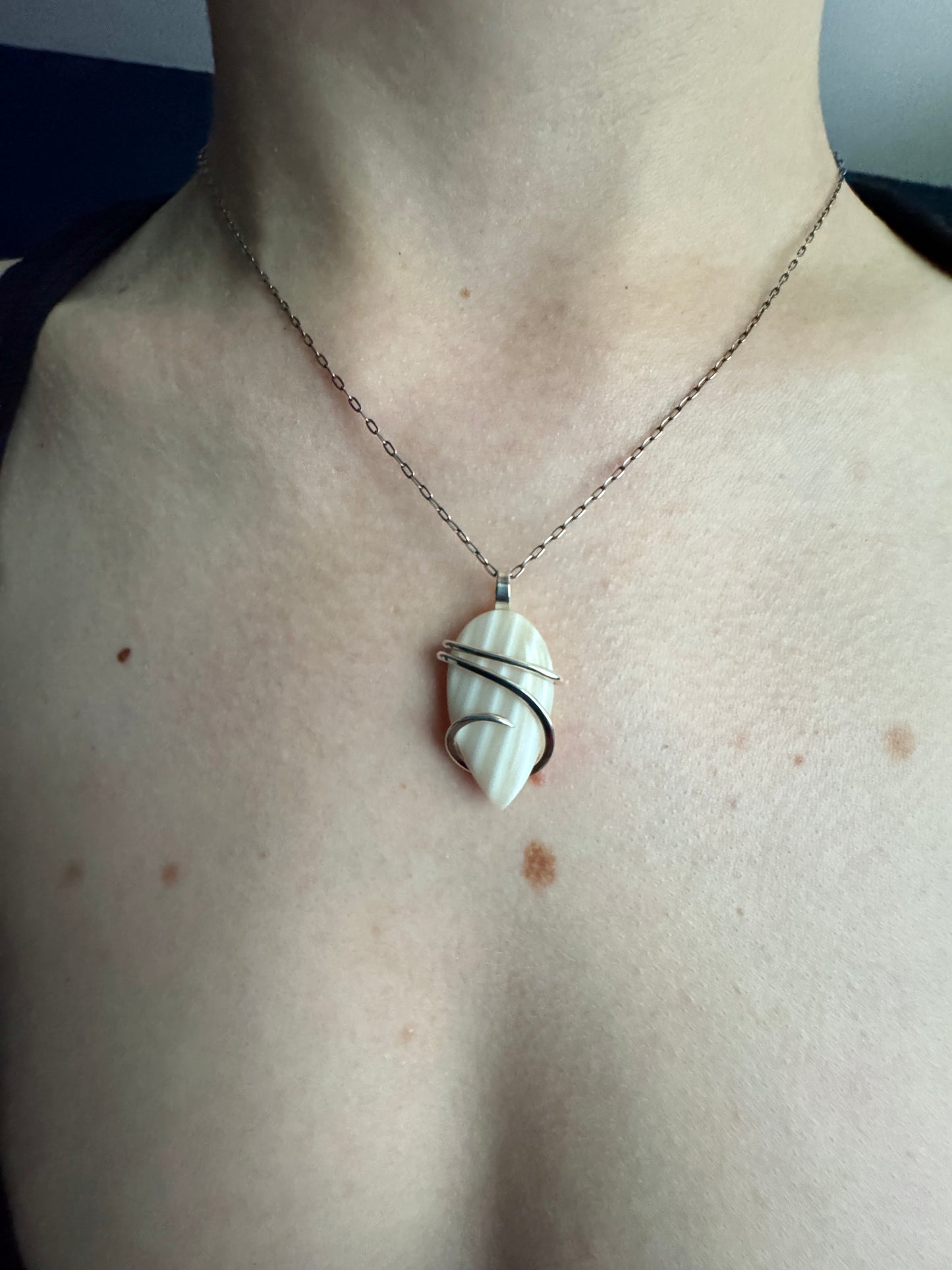 Shell in forged sterling silver pendant