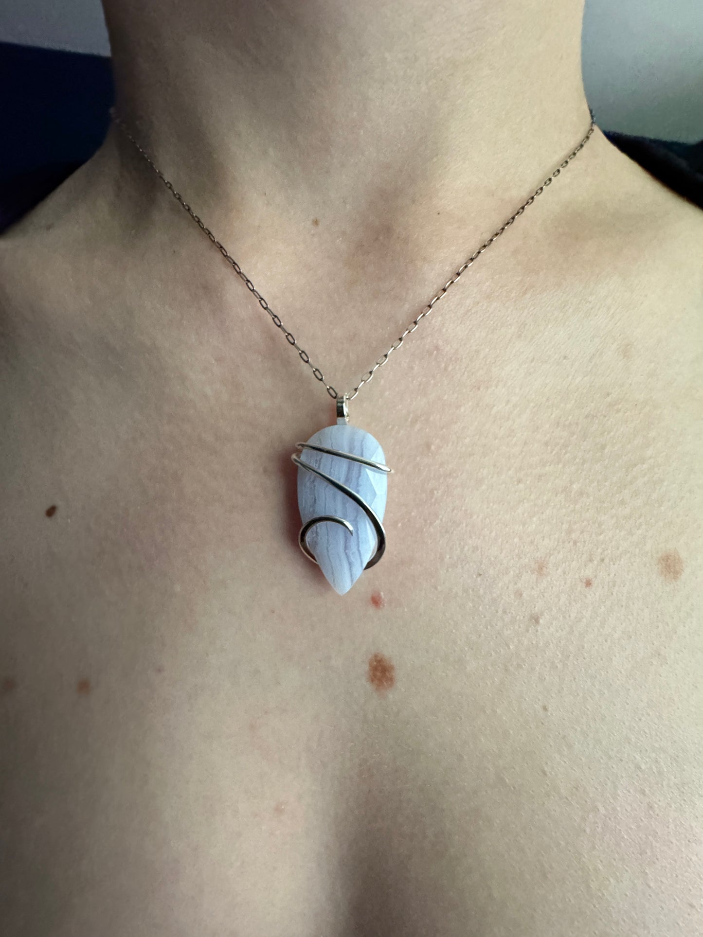 Faceted blue lace agate in sterling silver pendant