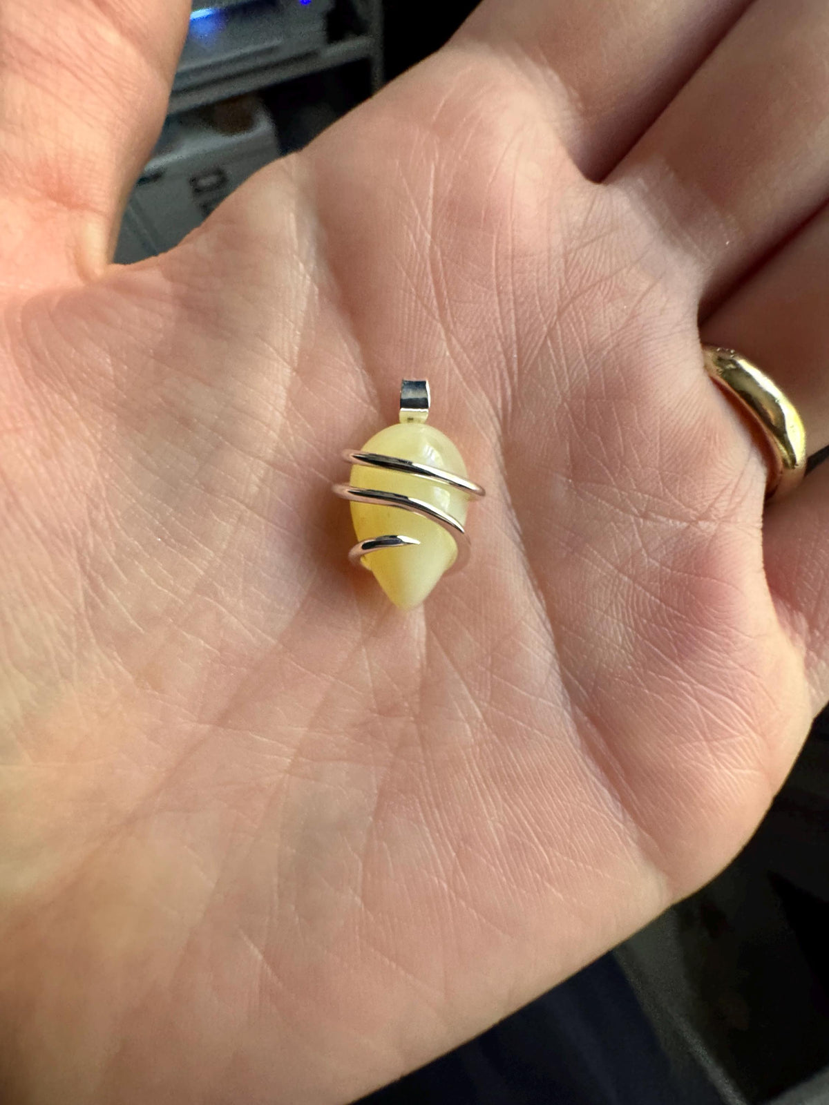 Yellow opal set in forged sterling silver pendant