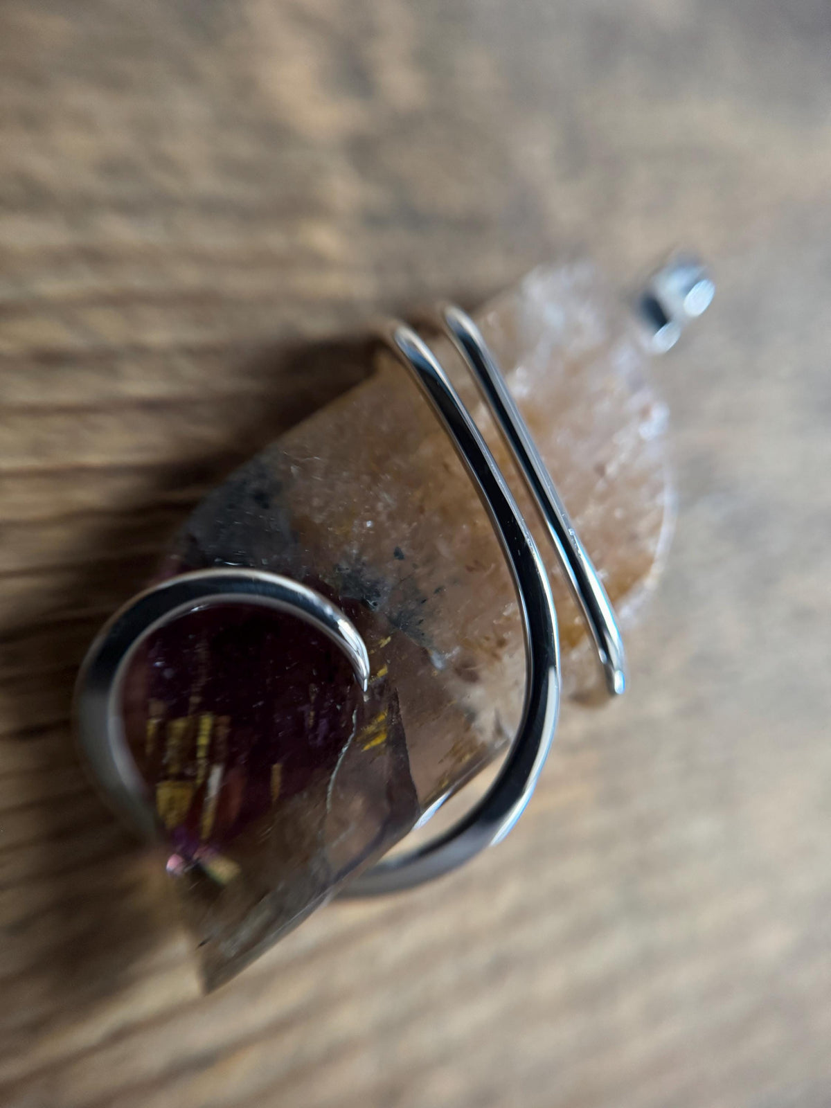 Faceted super seven in sterling silver pendant