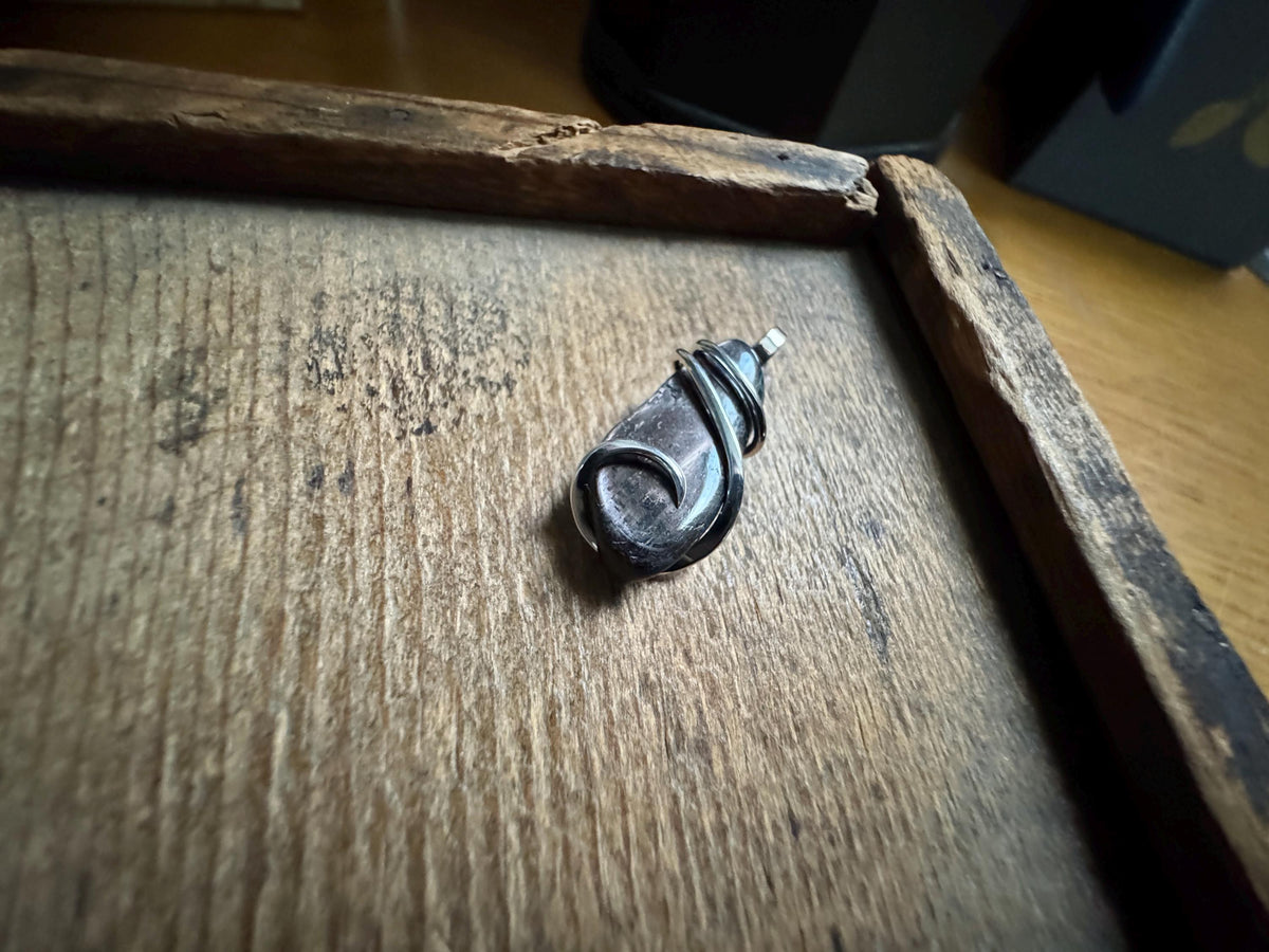 Hypersthene in forged sterling silver pendant