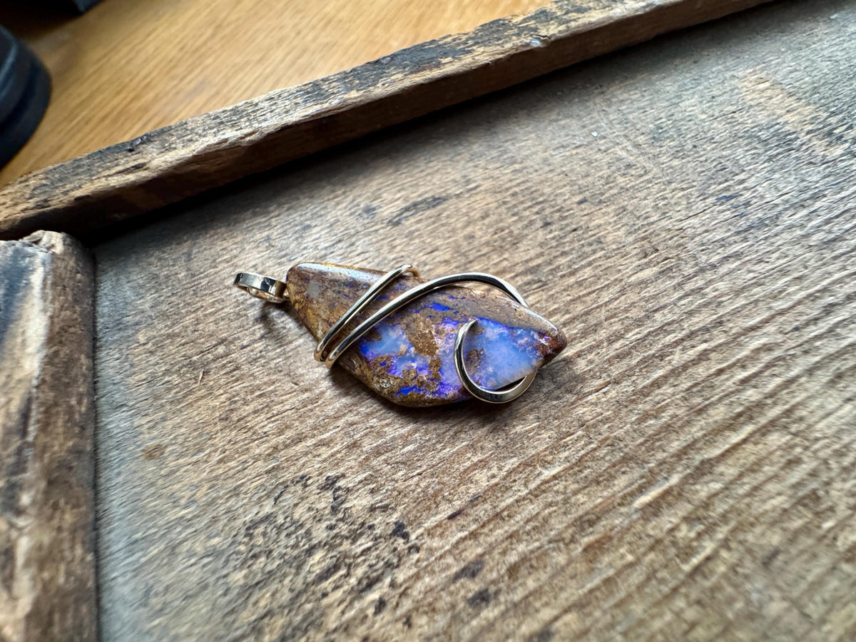 Boulder opal in 14k gold pendant