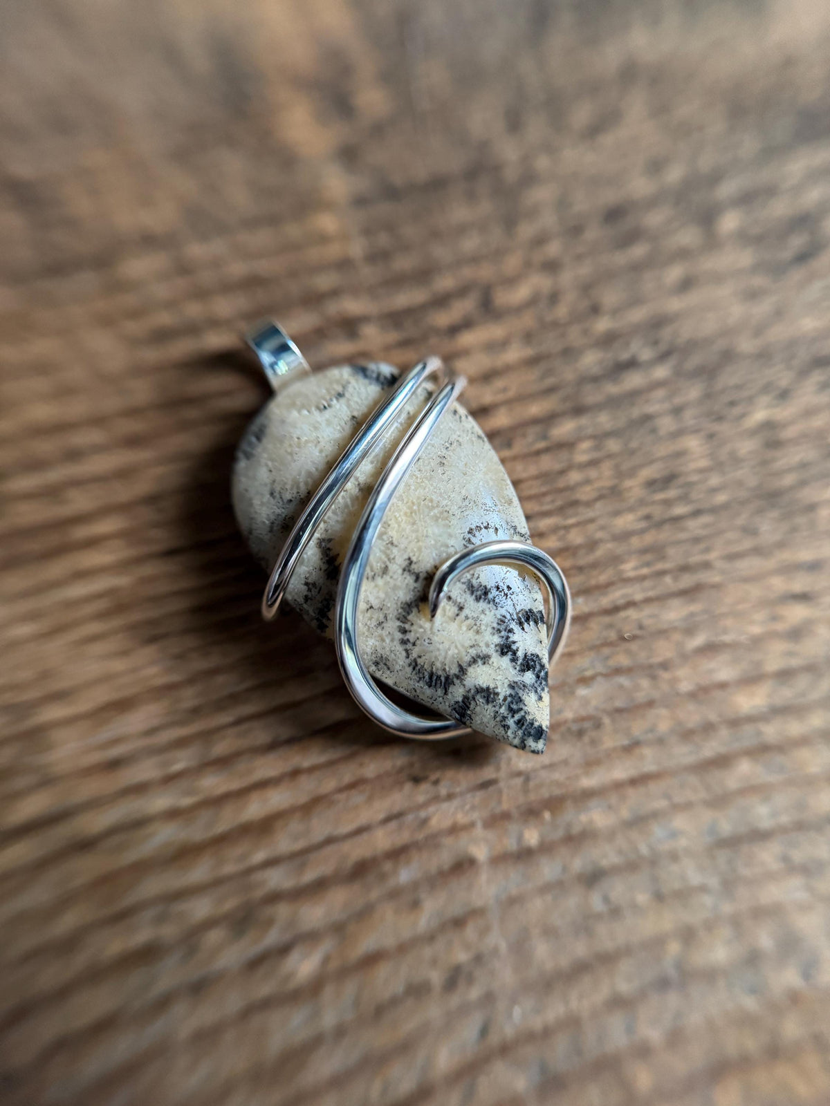 Fossilized coral in sterling silver pendant
