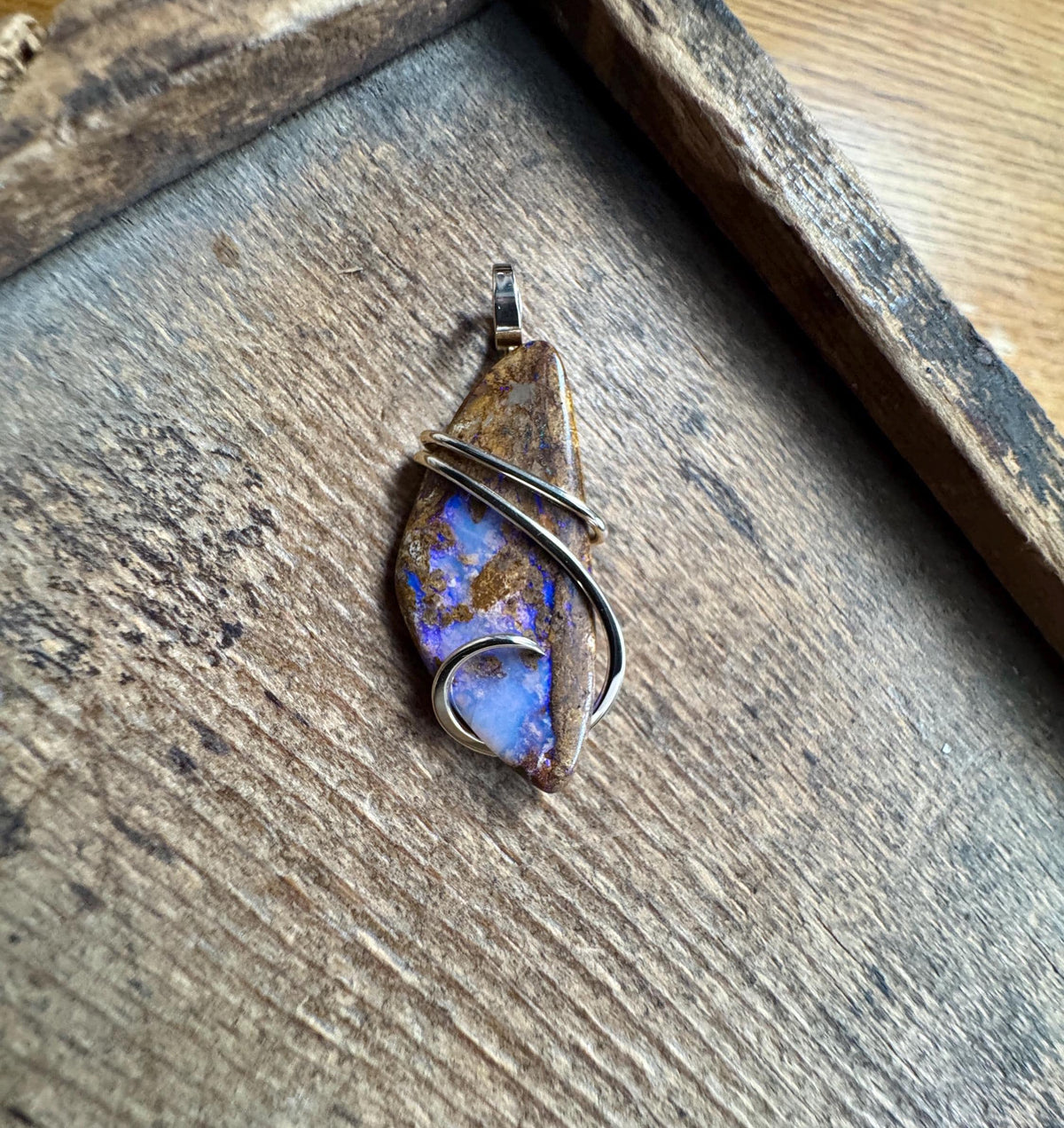 Boulder opal in 14k gold pendant