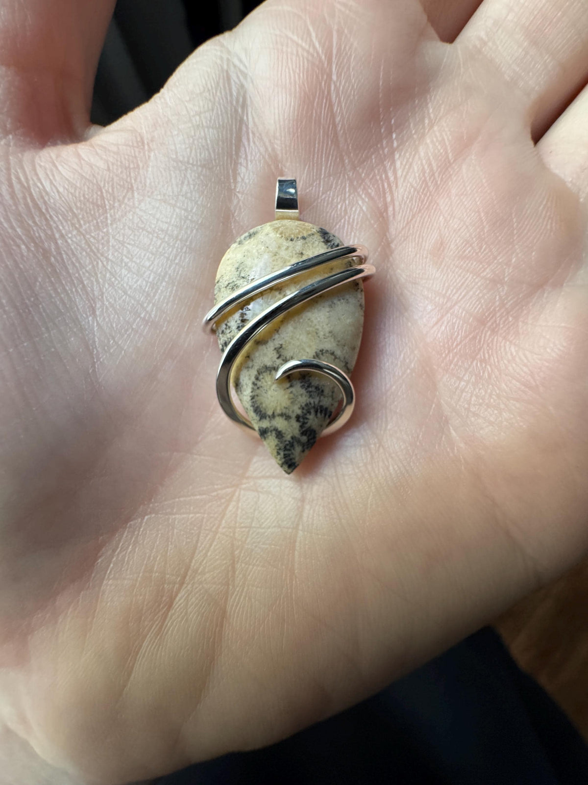 Fossilized coral in sterling silver pendant