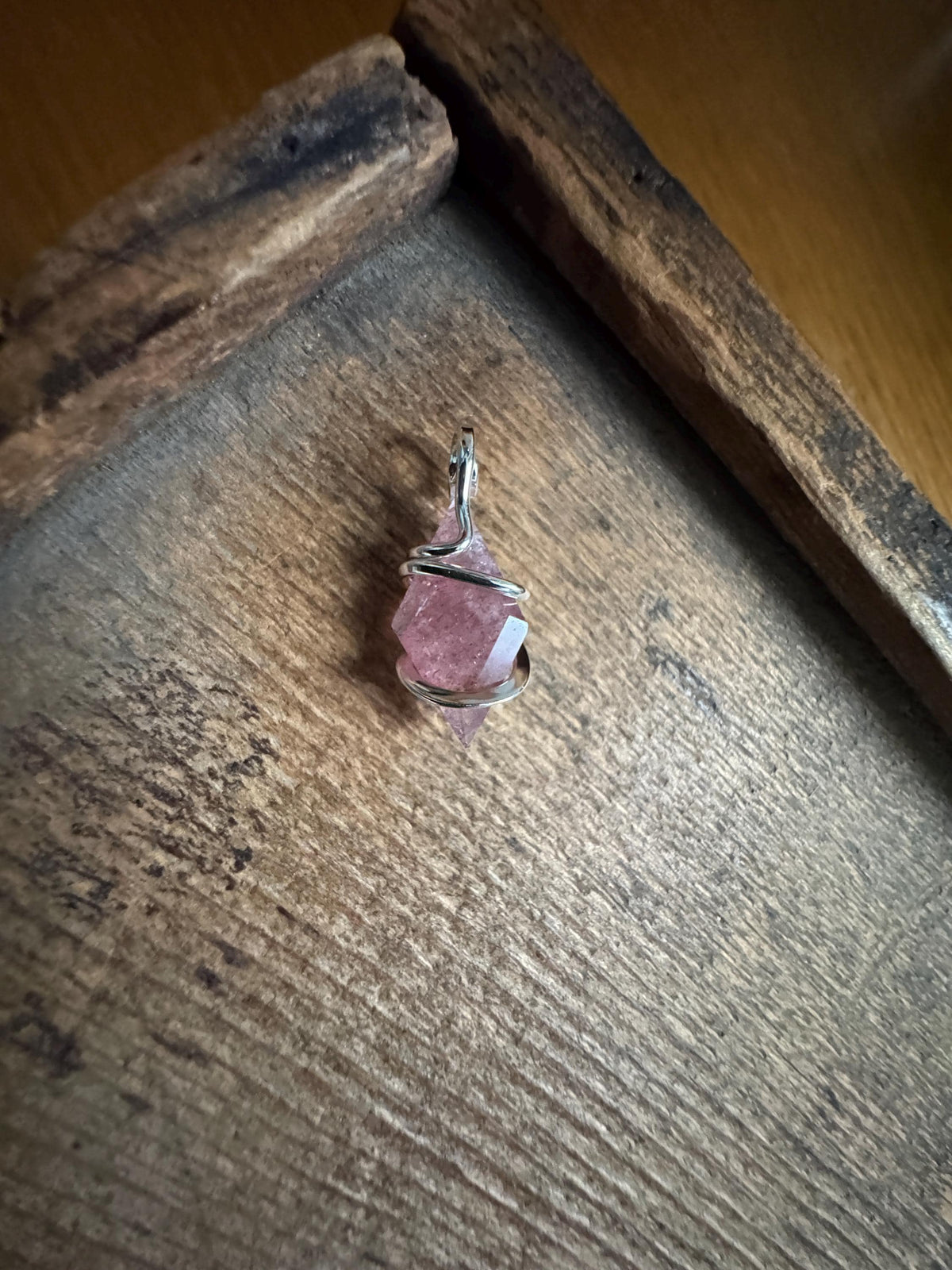 Faceted strawberry quartz in sterling silver pendant