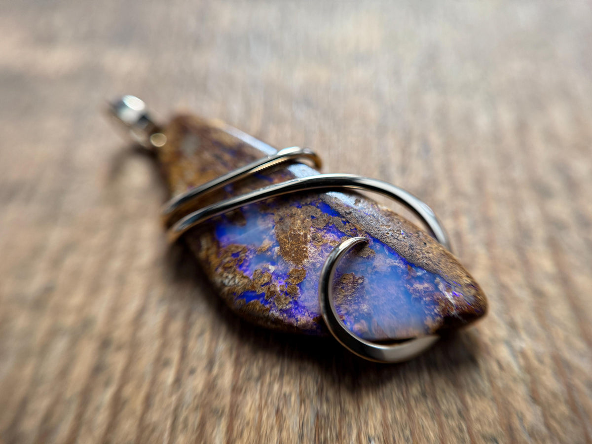 Boulder opal in 14k gold pendant
