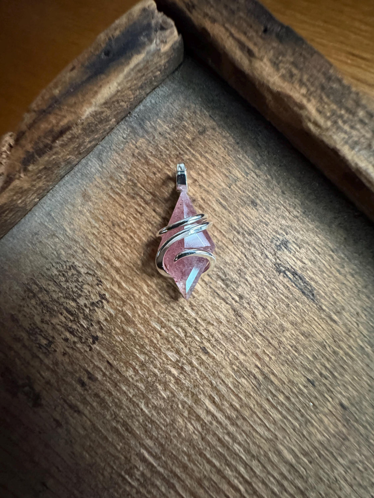Faceted strawberry quartz in sterling silver pendant