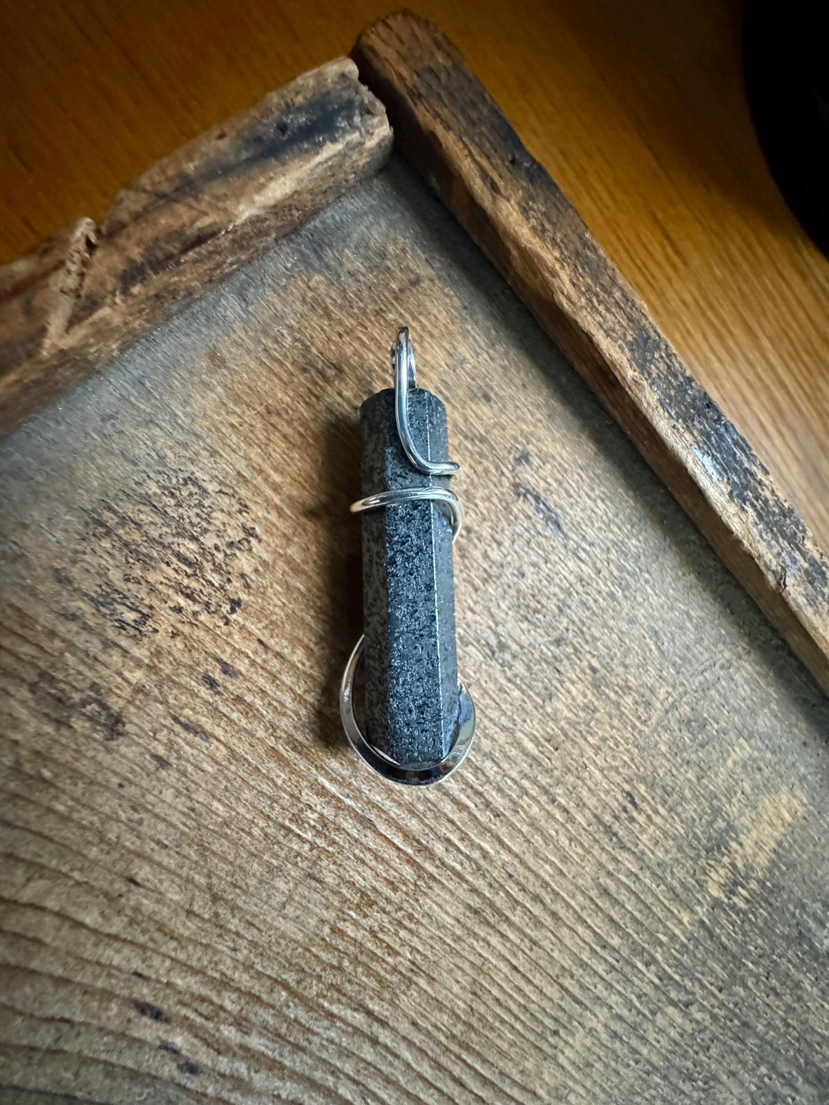 Hematite point in sterling silver pendant