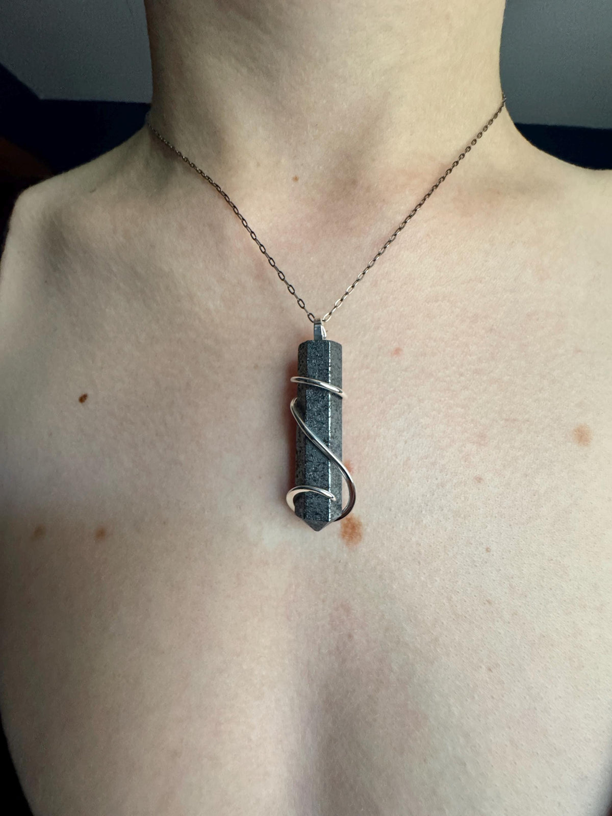 Hematite point in sterling silver pendant