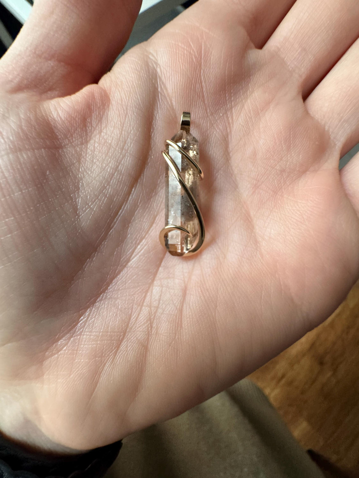 Topaz crystal in 14k gold pendant