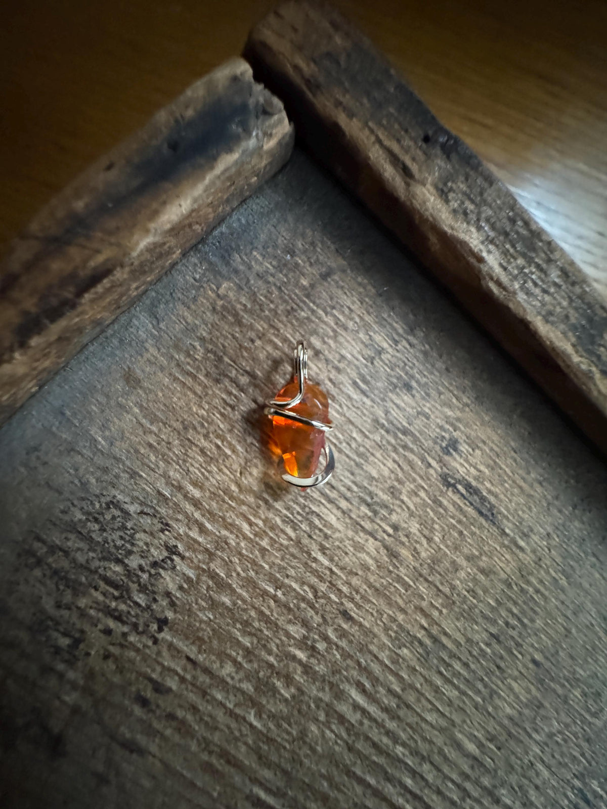 Fire opal in 14k gold pendant