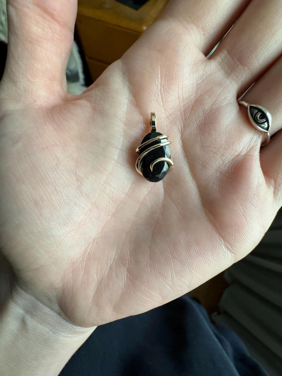 Faceted black tourmaline in 14k gold pendant