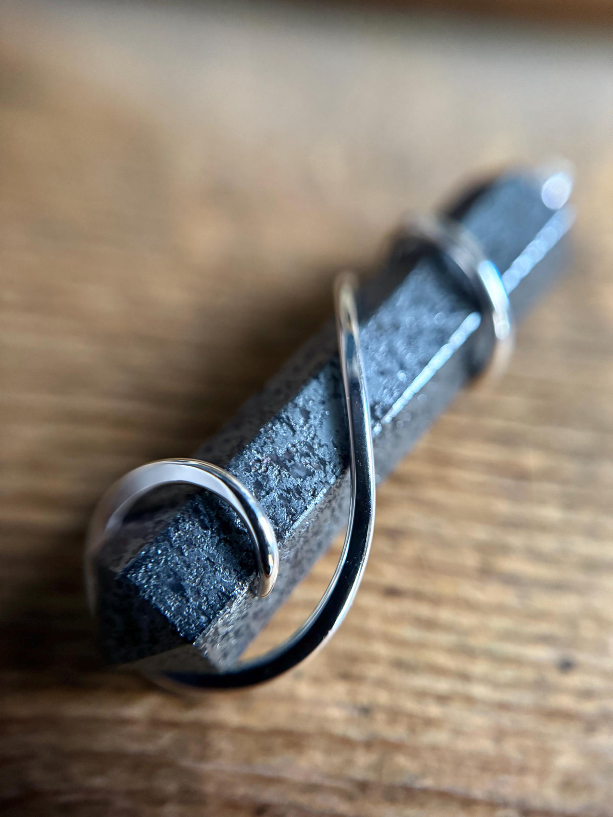 Hematite point in sterling silver pendant