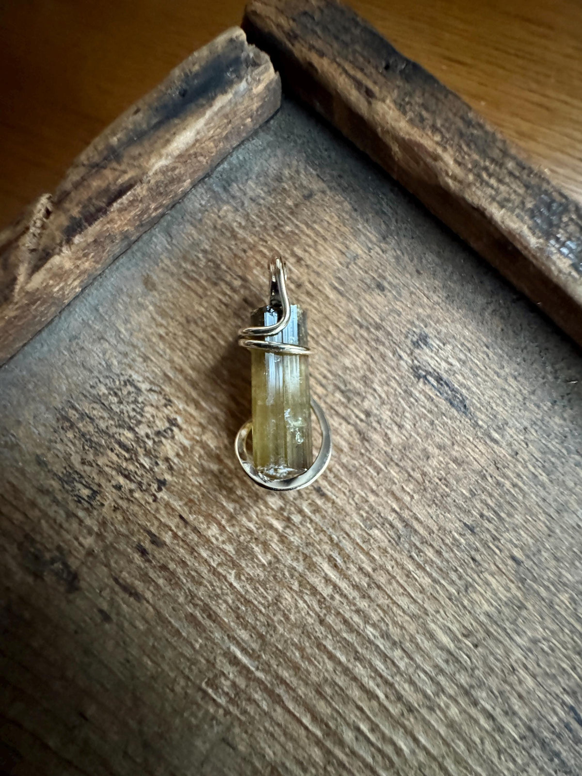 Yellow tourmaline crystal in 14k gold pendant
