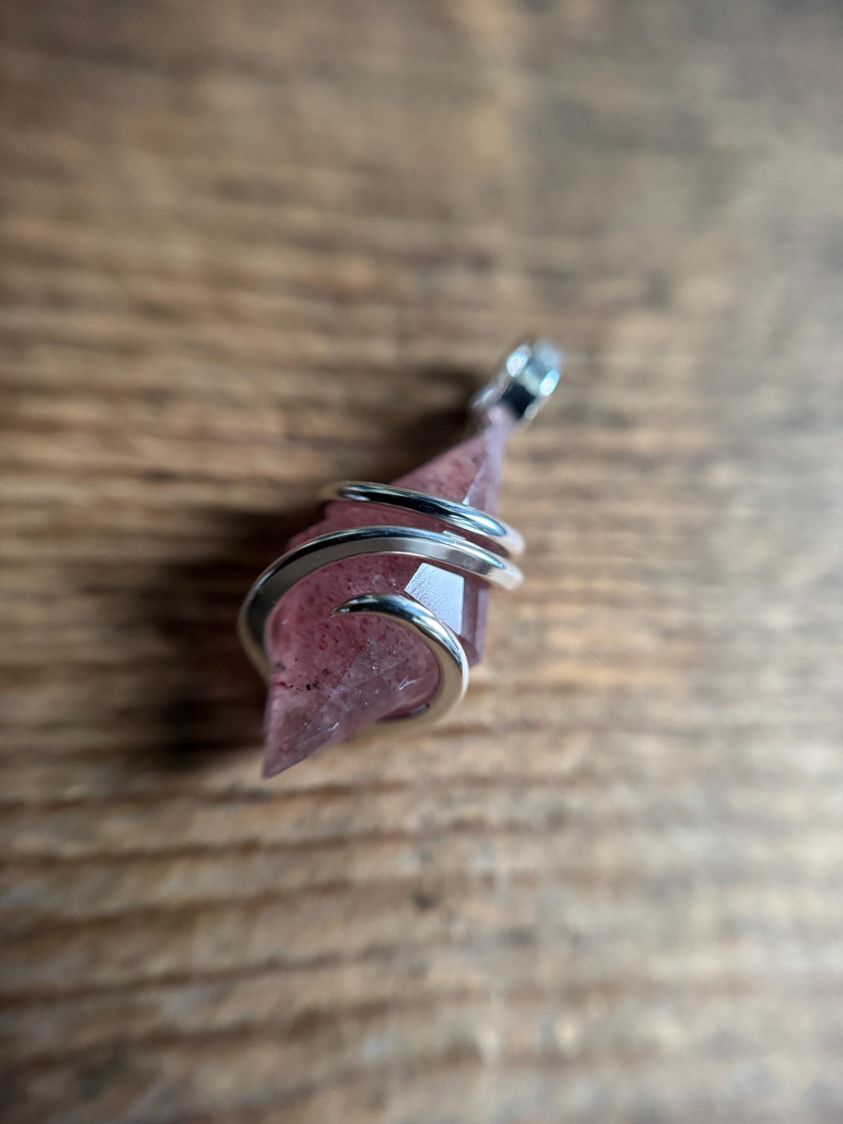 Faceted strawberry quartz in sterling silver pendant