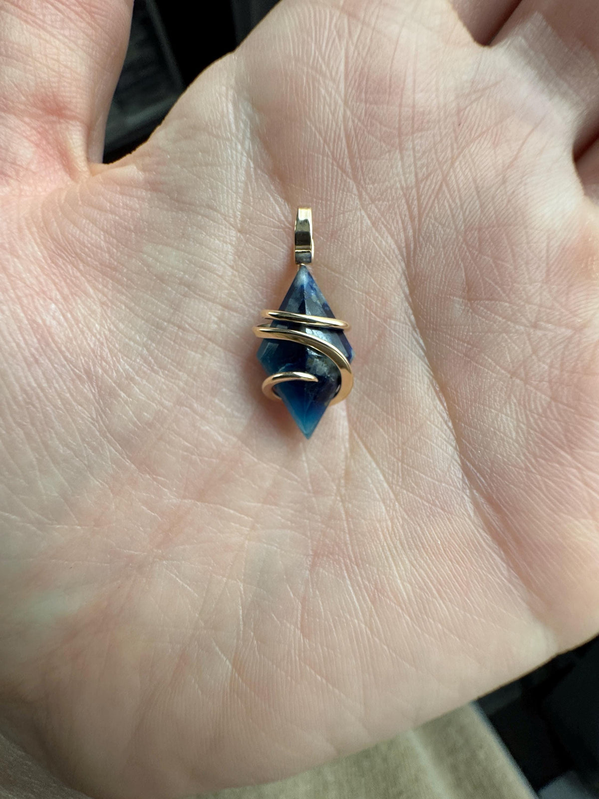 Faceted afghanite in 14k gold pendant
