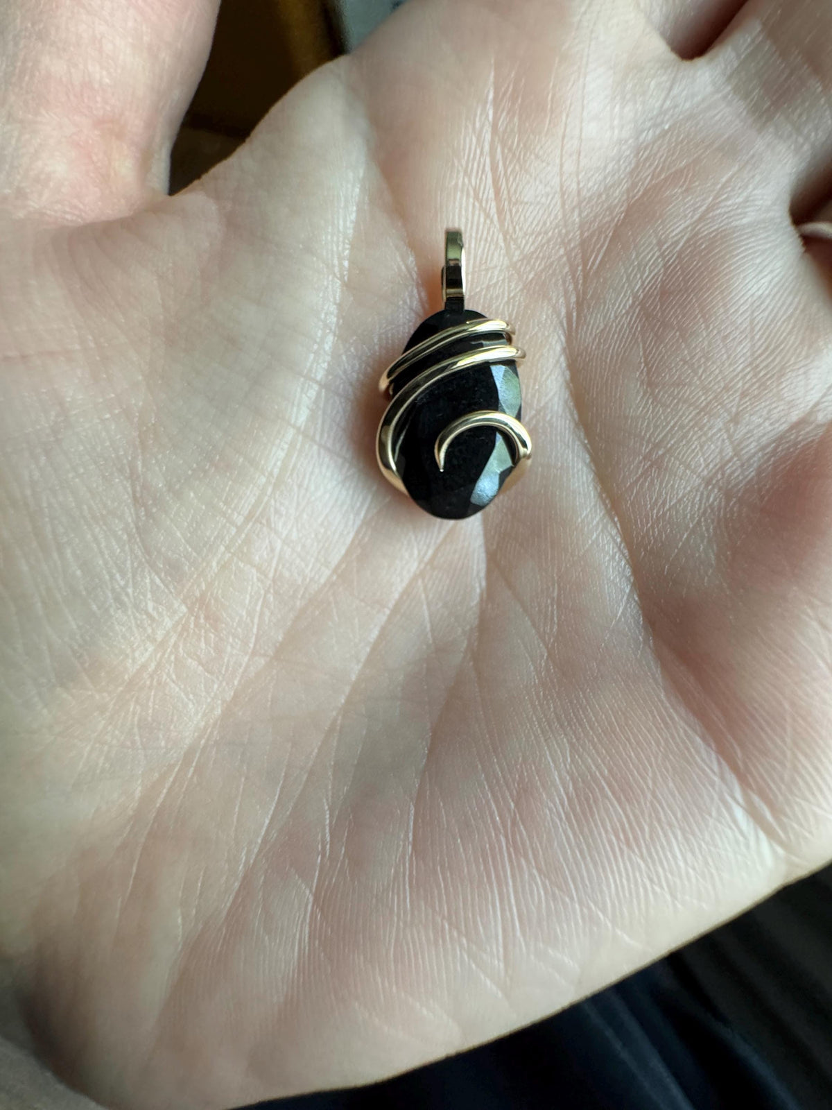 Faceted black tourmaline in 14k gold pendant