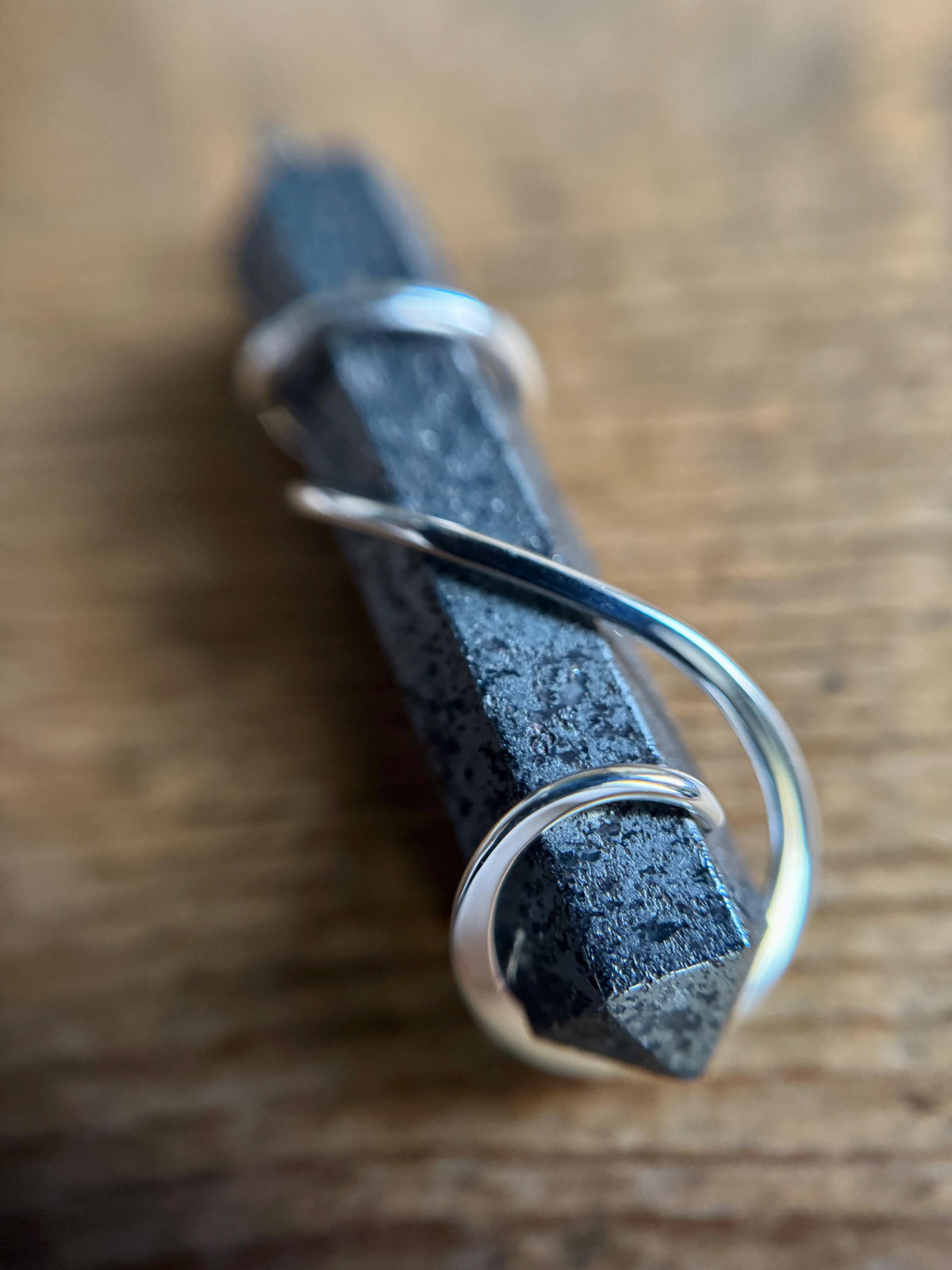 Hematite point in sterling silver pendant