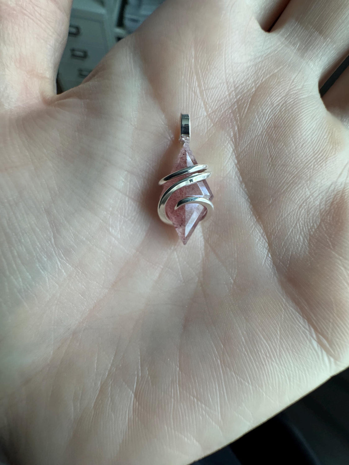 Faceted strawberry quartz in sterling silver pendant