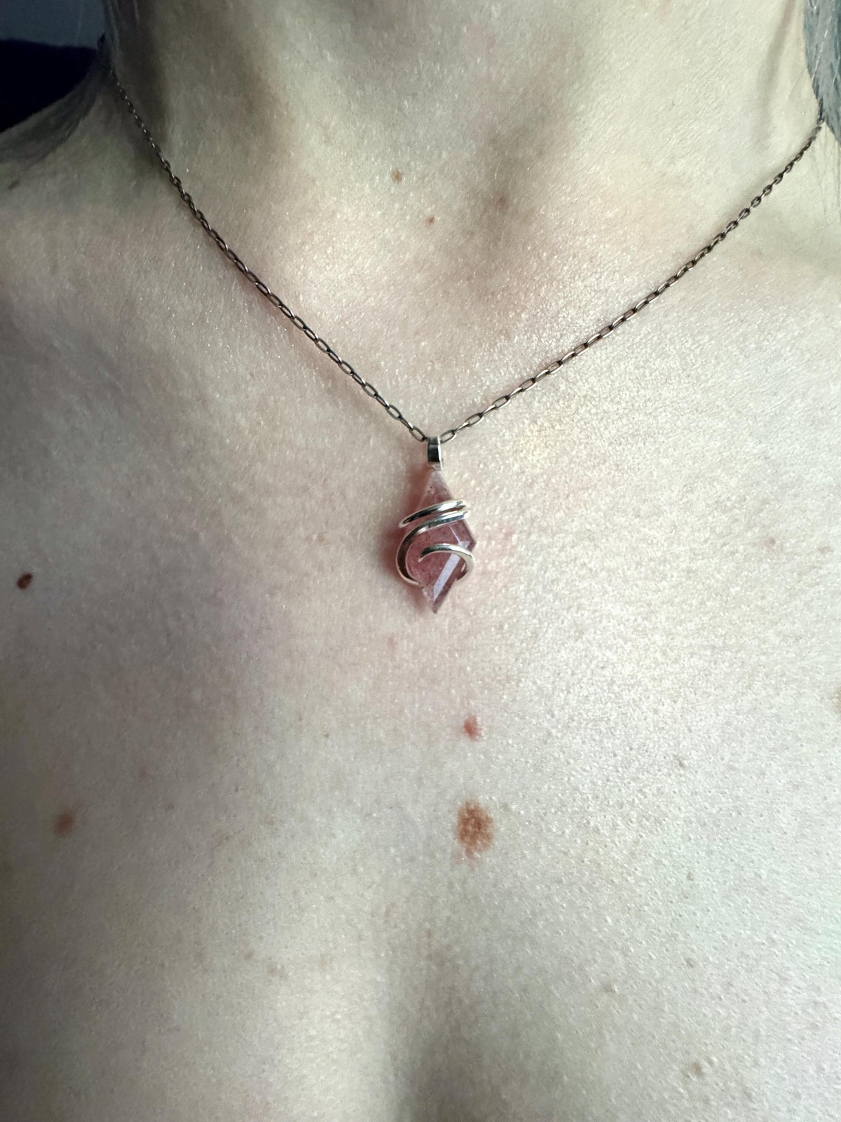 Faceted strawberry quartz in sterling silver pendant