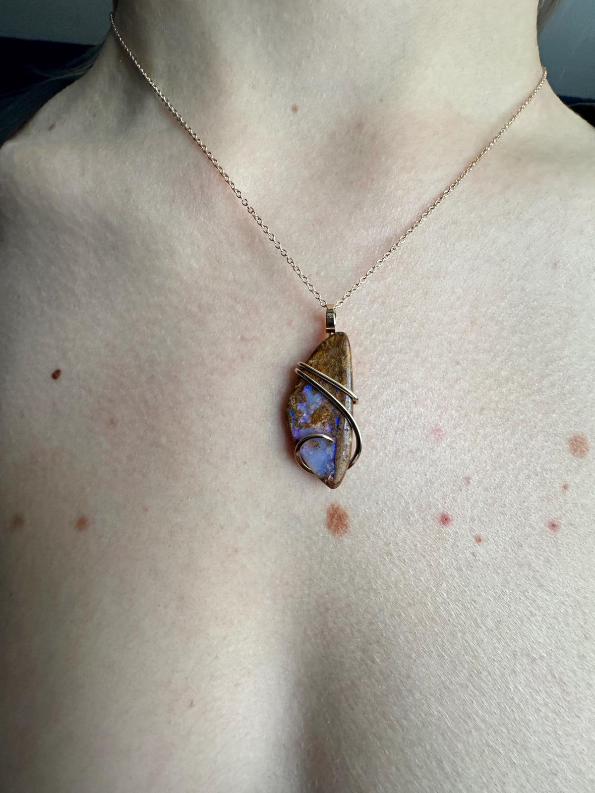 Boulder opal in 14k gold pendant