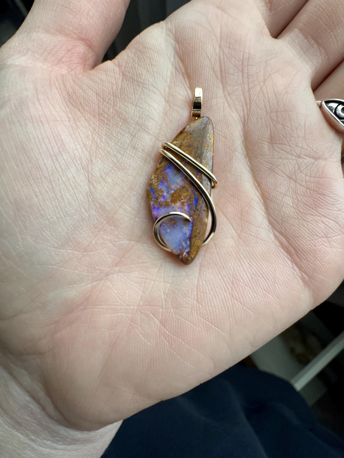 Boulder opal in 14k gold pendant