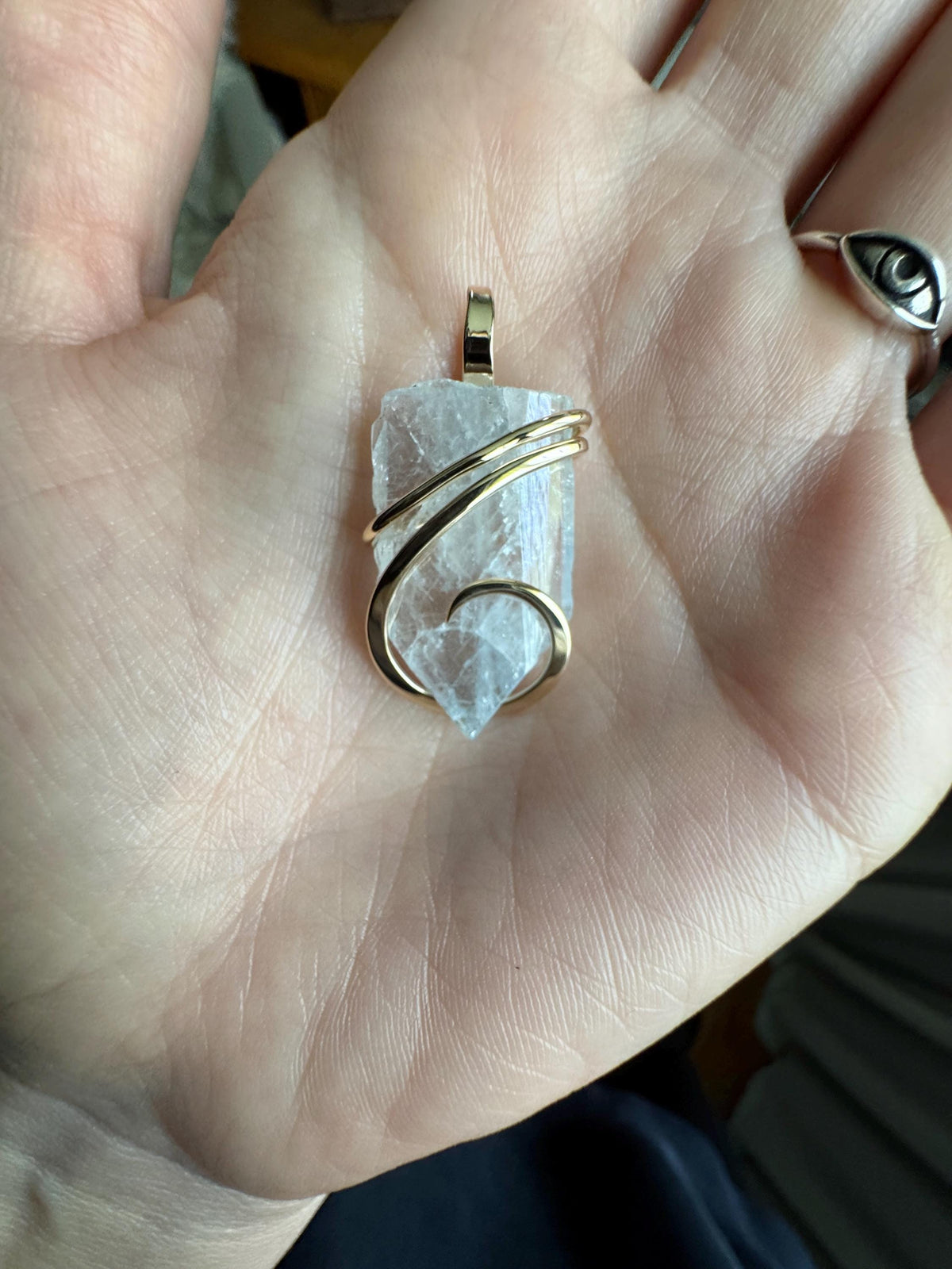 Blue celestite crystal in 14k gold pendant