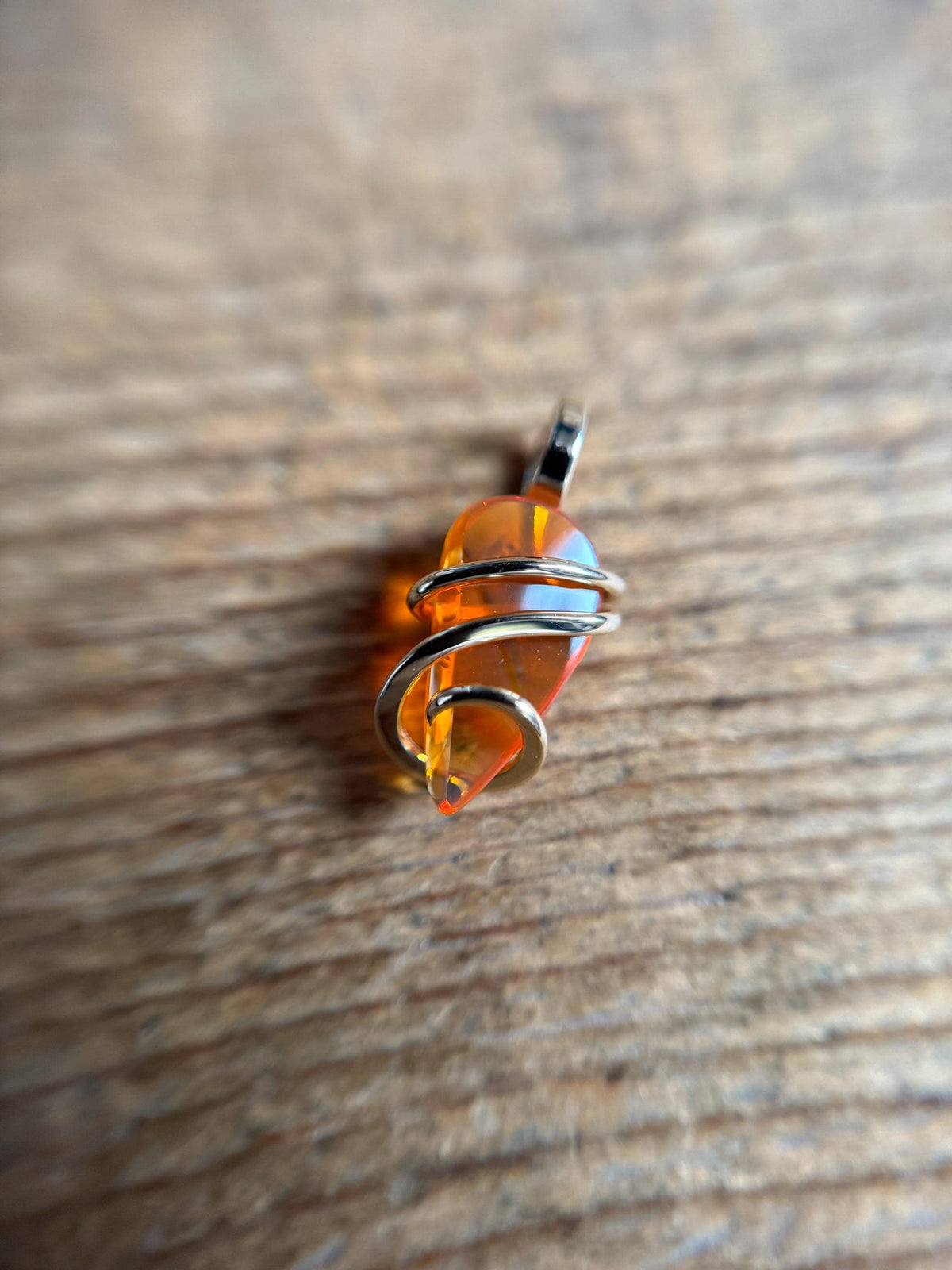 Fire opal in 14k gold pendant