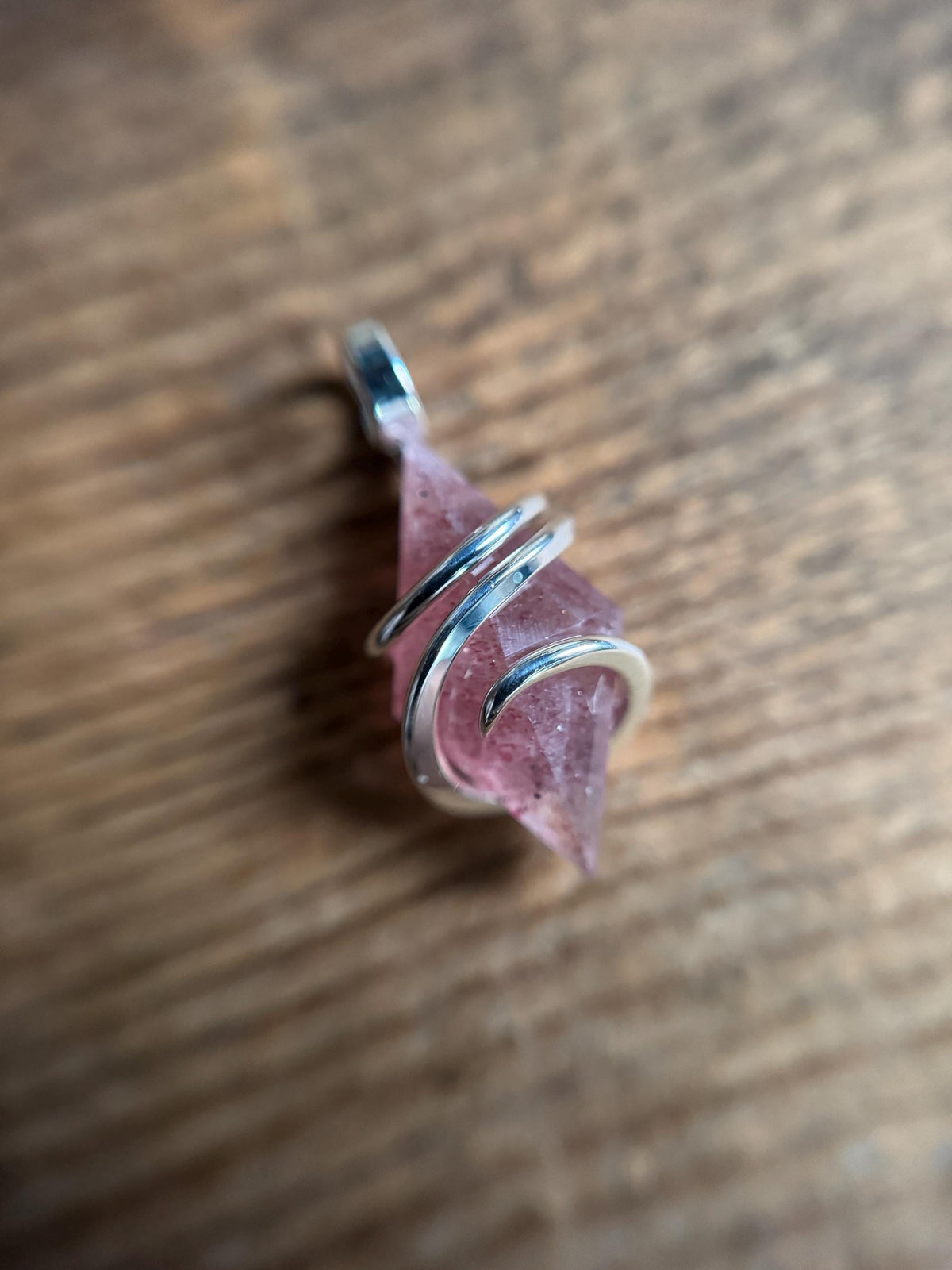 Faceted strawberry quartz in sterling silver pendant