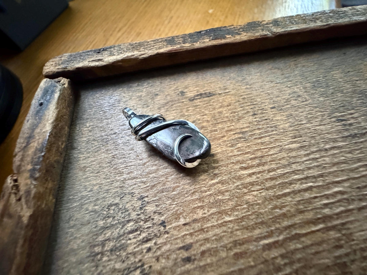 Hypersthene in forged sterling silver pendant