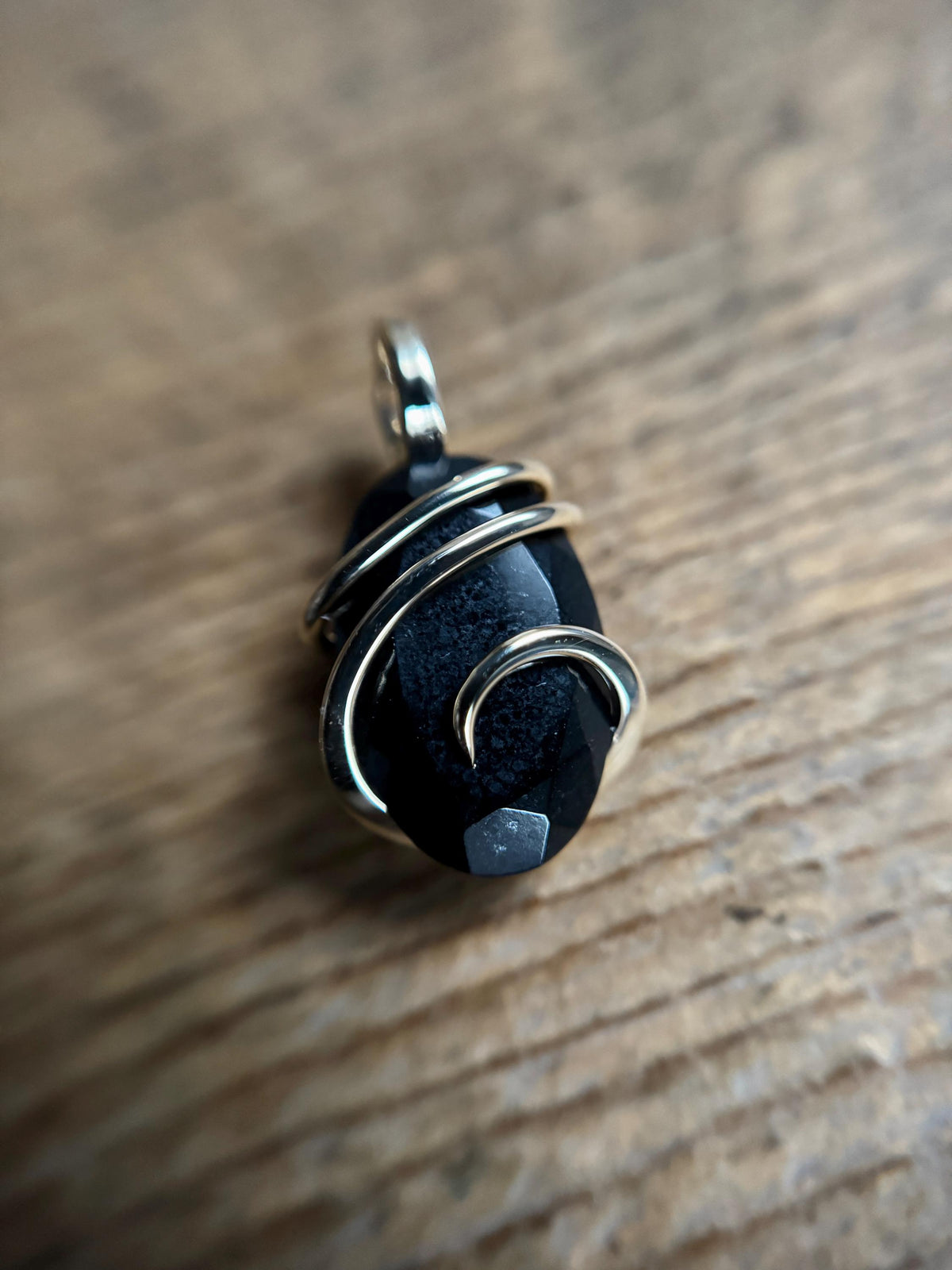 Faceted black tourmaline in 14k gold pendant
