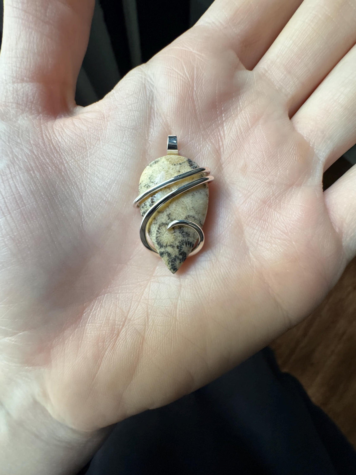 Fossilized coral in sterling silver pendant