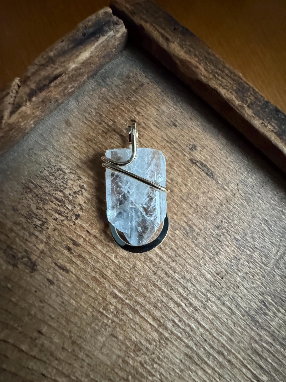 Blue celestite crystal in 14k gold pendant
