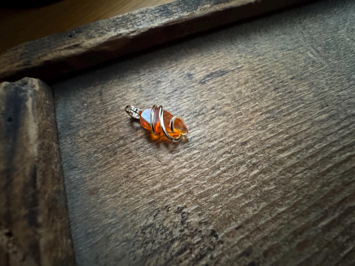 Fire opal in 14k gold pendant