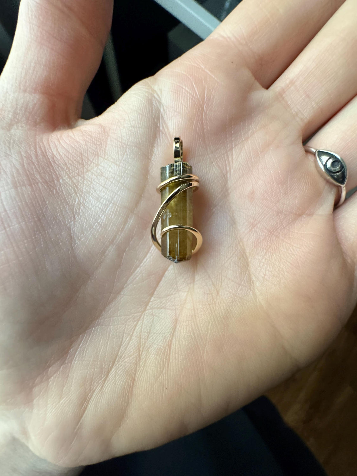 Yellow tourmaline crystal in 14k gold pendant