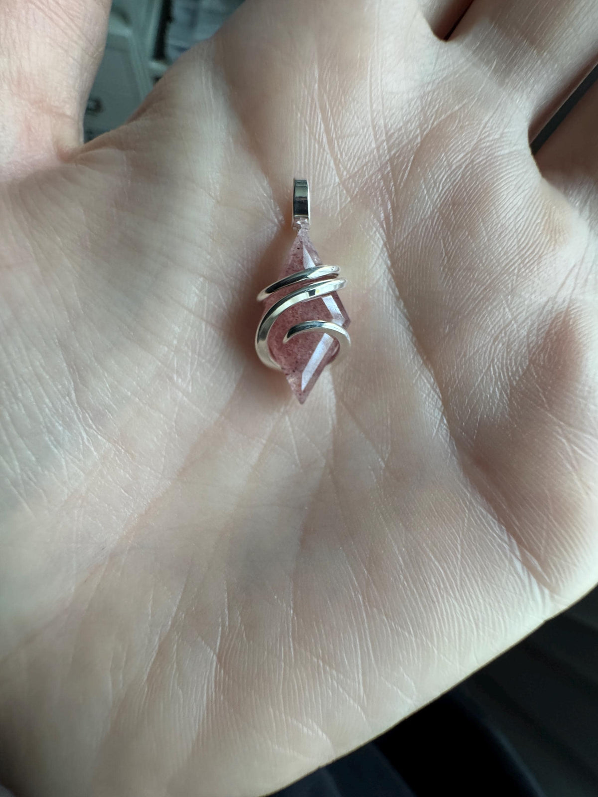 Faceted strawberry quartz in sterling silver pendant