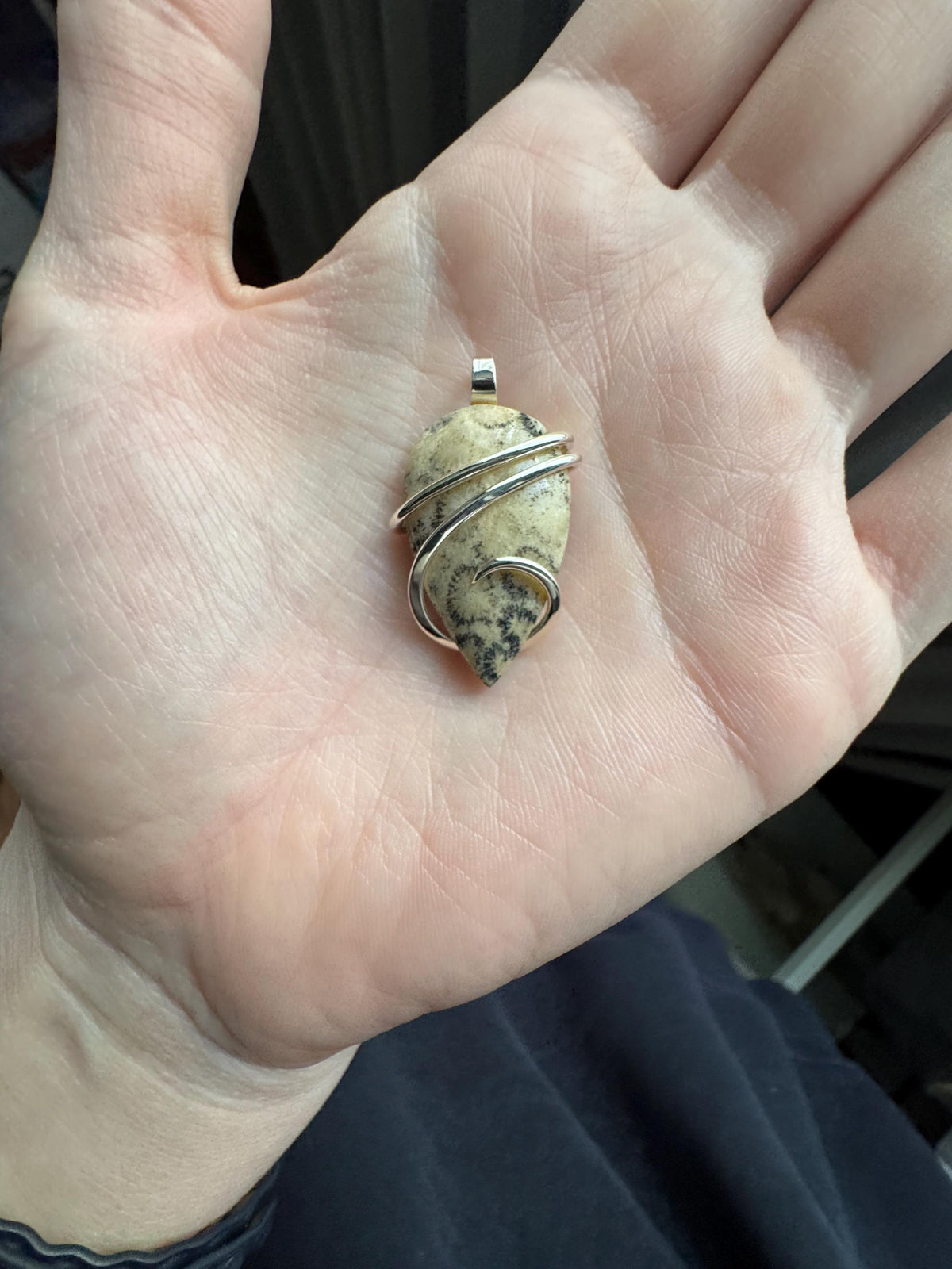 Fossilized coral in sterling silver pendant