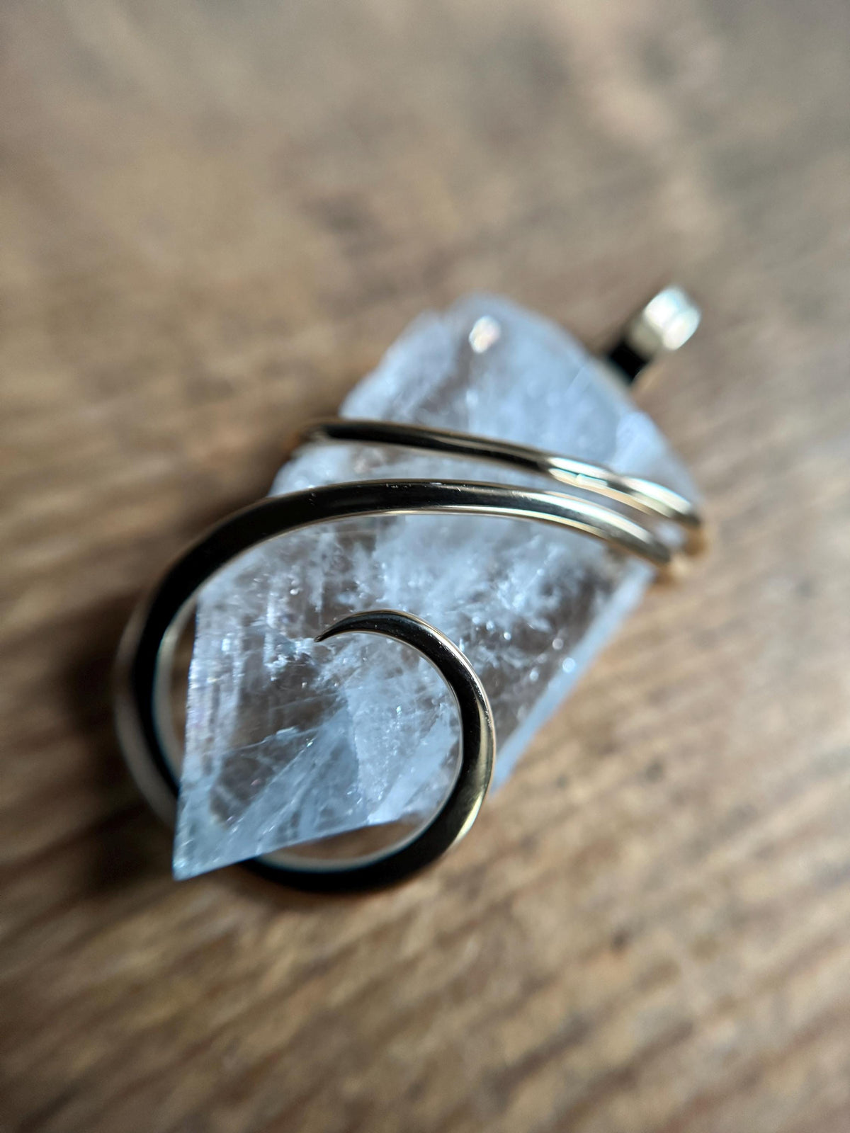 Blue celestite crystal in 14k gold pendant