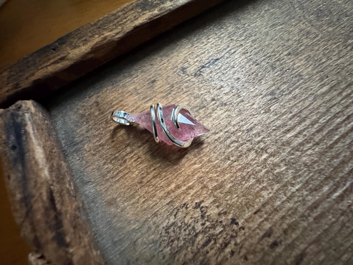 Faceted strawberry quartz in sterling silver pendant